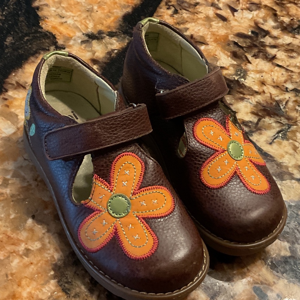 Umi Brown leather Mary Jane’s Shoes with Orange Floral Accent. Toddler size 10.5